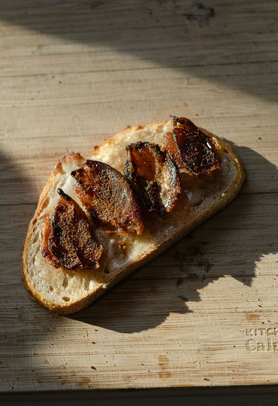 Fig and cultured butter tartine on rustic bread
