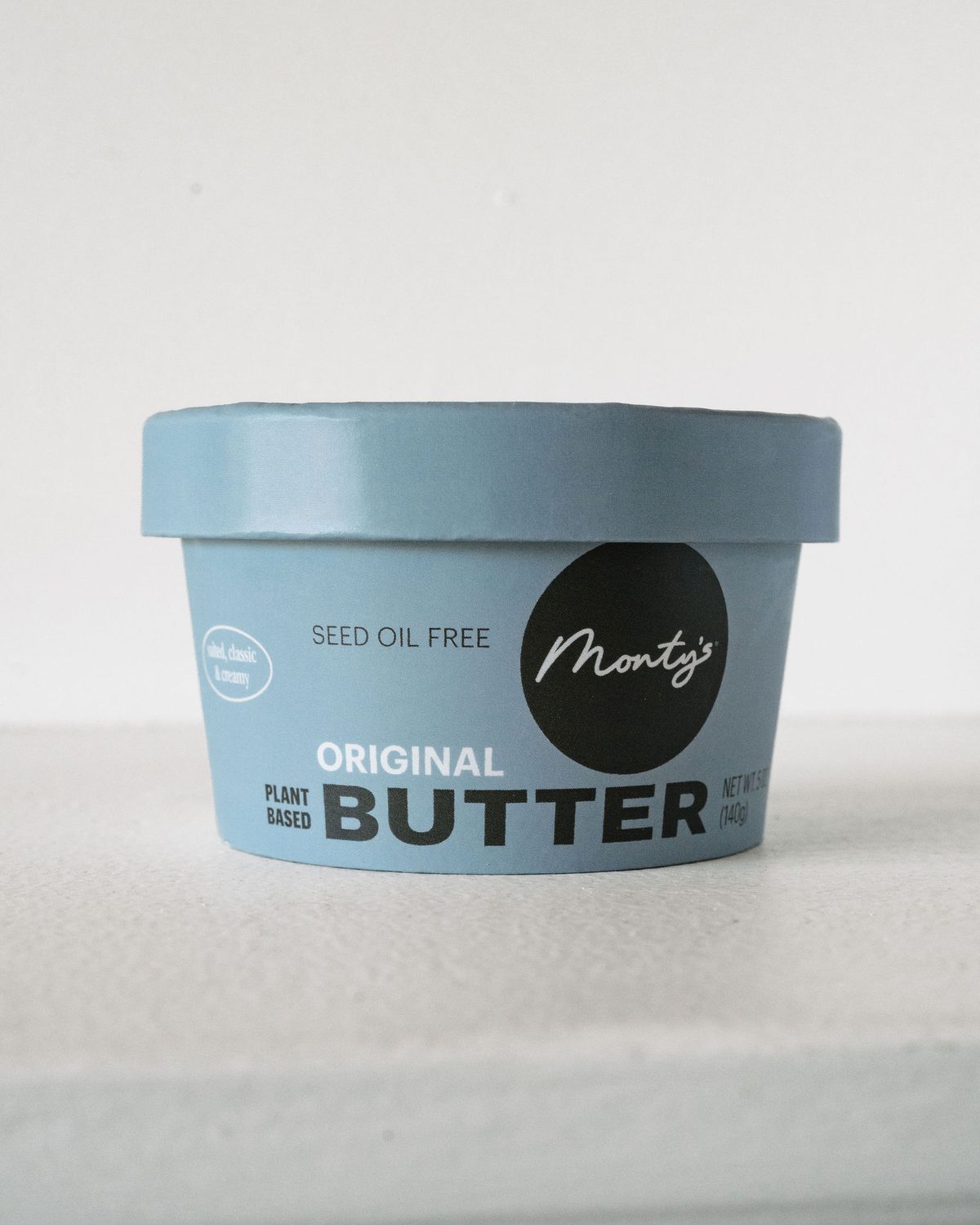 A single cup of Monty's Original Plant Based Butter