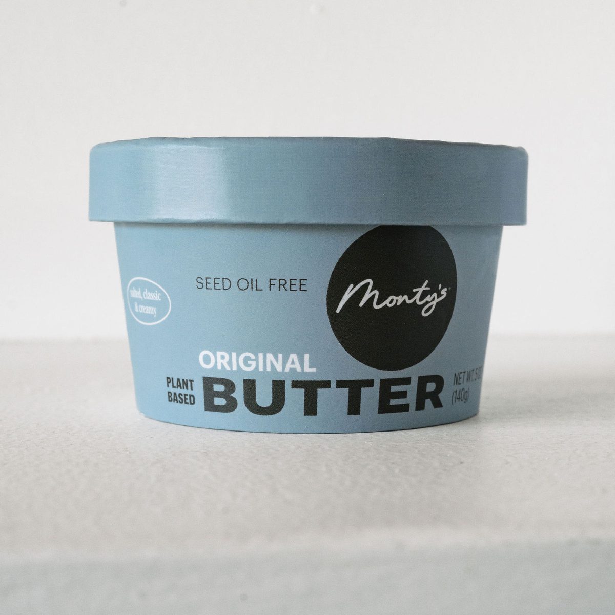 A single cup of Monty's Original Plant Based Butter