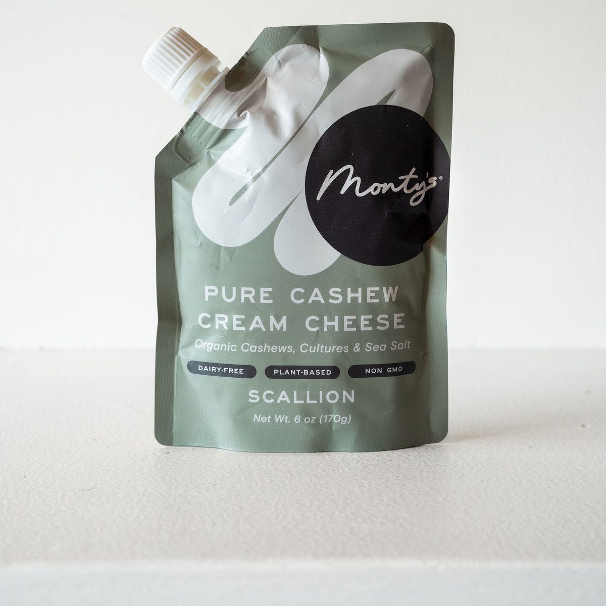 A pouch of Monty's Pure Cashew Cream Cheese, Scallion